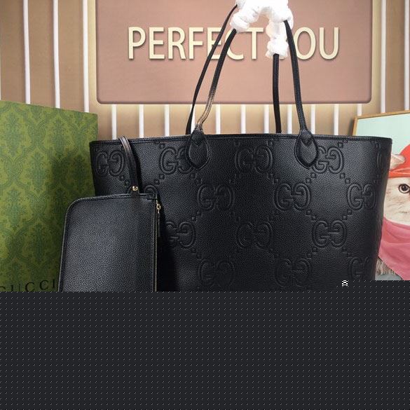 G*u*i shopping bags
